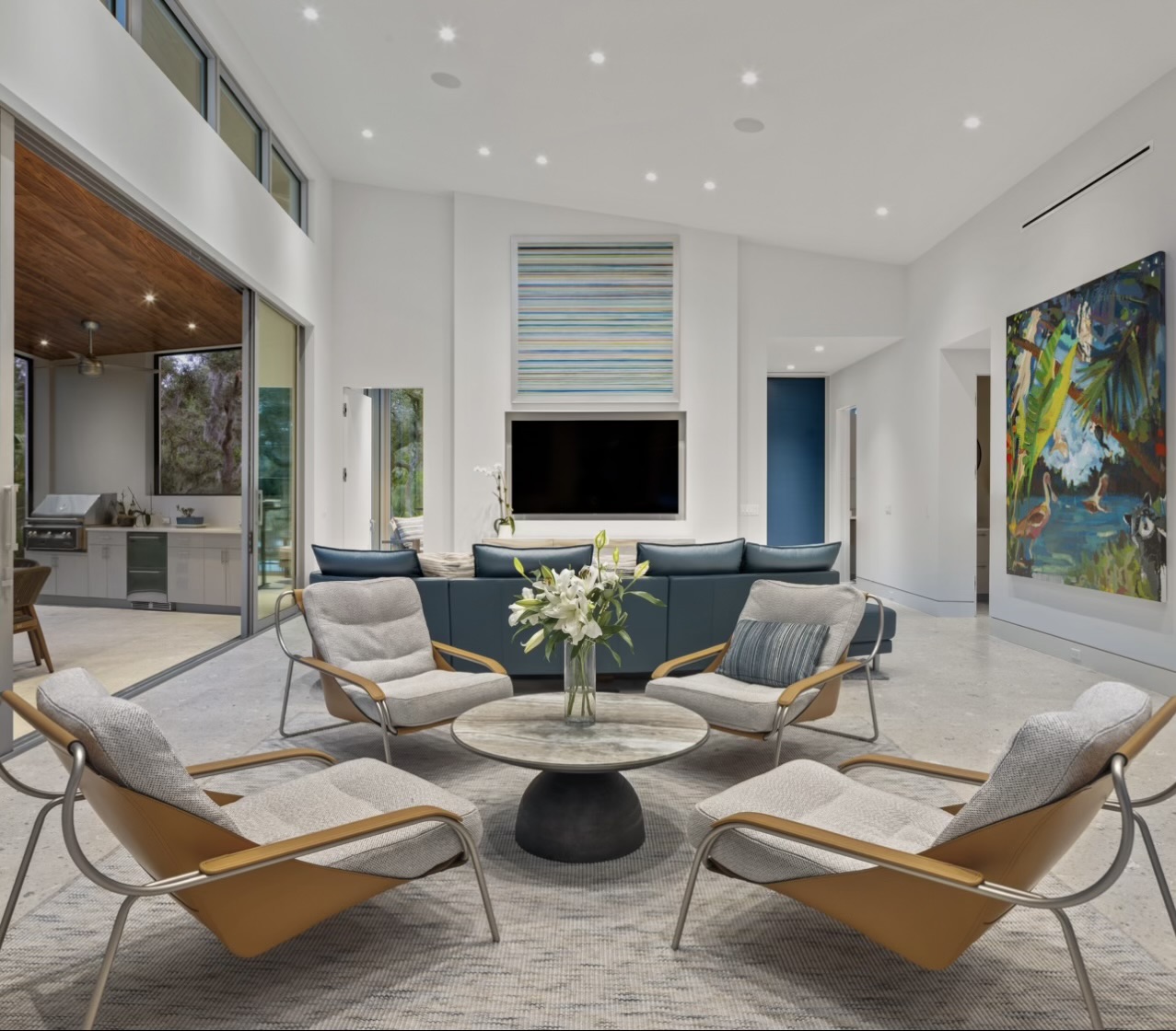 MMinteriors modern open-concept living space with curated art and indoor-outdoor flow